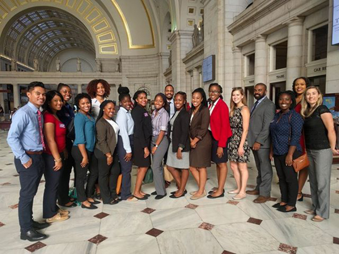 Diverse group of AOTA members posing at OT Hill Day in Washington DC