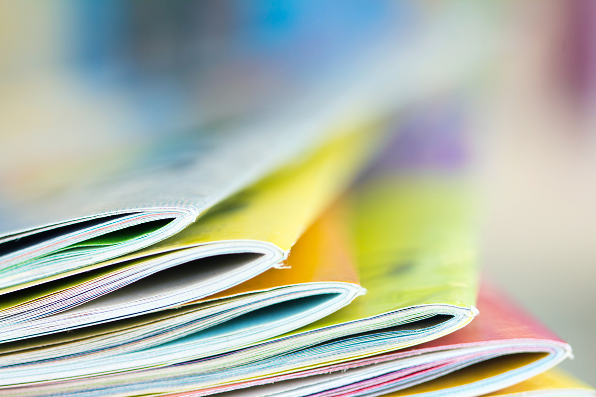 Close up shot of a stack of magazines